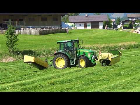 John Deere mowing grass