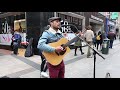 One u2 covered by david brennan on grafton street