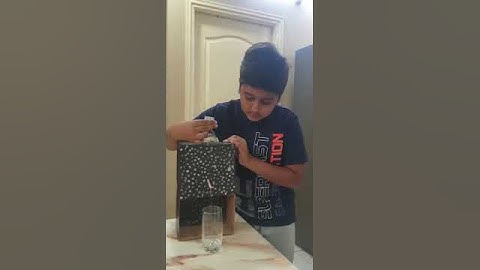 Siddharth, Grade 8, Demonstrating Water Dispenser Activity