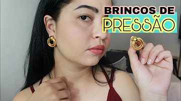 O que é um brinco de pressão?