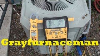 Check charge in the air conditioner at low ambient temperatures