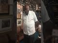 Reverend Linton Prays from the Howard-Linton Barbershop