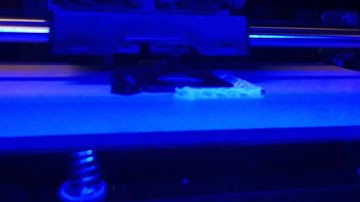 3d printer printing a mini traffic cone