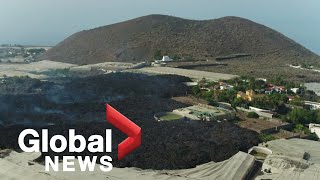 La Palma volcano: Drone footage shows path of devastation as lava makes its way to ocean