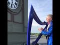 Watch now: Harpist Chris Molloy performs on top of the Phoenix Building