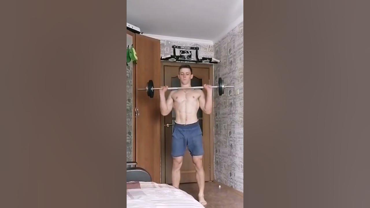 Заведение за голову штанги стоя