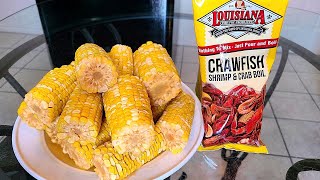 New Orleans Style boiled corn | Fresh corn cobs simmered in a highly seasoned liquid and soaked.