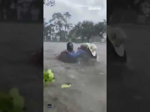 Dramatic rescue of elderly man stranded in car during hurricane ian