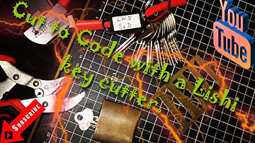 Cutting a key to code using a lishi key cutter. (356)