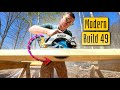 Modern Home Build | 49 of 50 | sealed crawl space, door hardware, rain chain, kitchen sink install