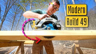 Modern Home Build | 49 of 50 | sealed crawl space, door hardware, rain chain, kitchen sink install