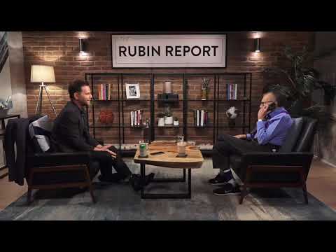 Larry King takes a personal phone call during Dave Rubin interview