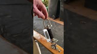Roller Furler made from a bike axel for a double outrigger sailing canoe.
