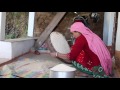 Separating rice grains from chaff by hand in ilam nepal