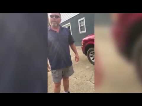 Woman Confronts Man Flying Nazi Flag From Home