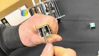 Disassembly of the Northern Light Multi-Light rattle reel prior to mounting on the UnderCover Guide