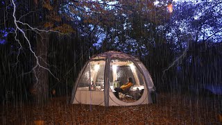 A girl enjoying an adventure in a transparent tent during thunderstorms, hail, and heavy rain.