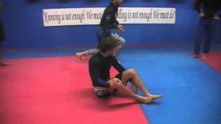 Attacking the feet to finish the kneebar