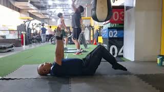 Dead Bug Arm Hold with knee-folded movement both legs