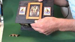Sarcophagus.wmv An Egyptian style puzzle box, with fifteen outer sliding panels, and two seperate keys. Very hard to open...