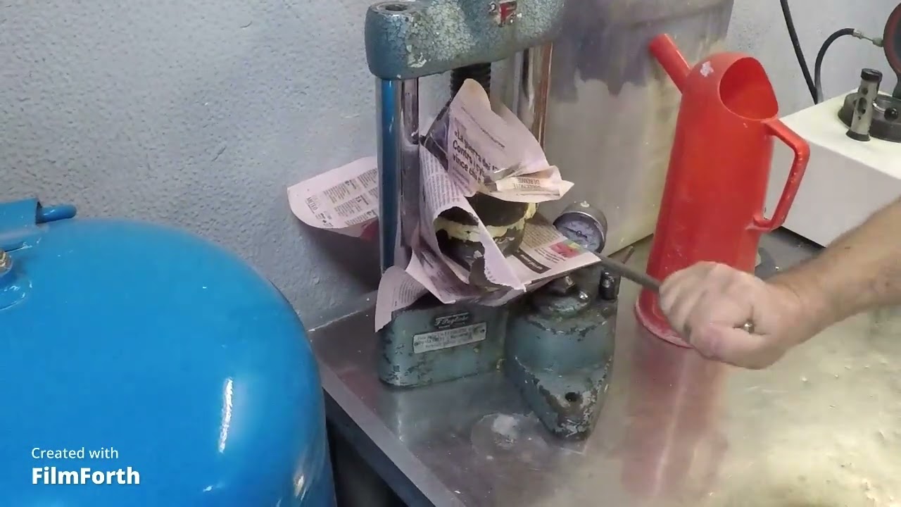 resinatura termoindurente di una protesi totale in muffola