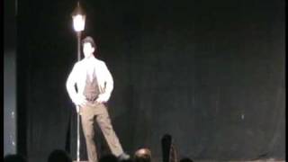 Carter Lynch performs "Leaning on a Lampost" in the College Light O...
