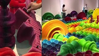 Chinese artist makes colorful paper guns that turn to flowers Chinese artist makes colorful paper guns that turn to flowers
