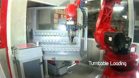 Comau Smart NM 45 - Milling head deburring