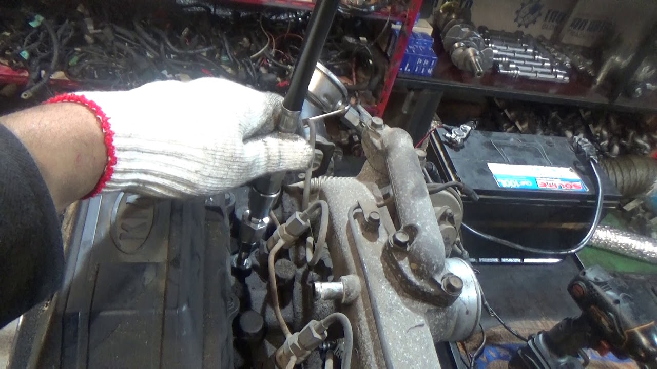 Проверка компрессии в двигателе JT 337400