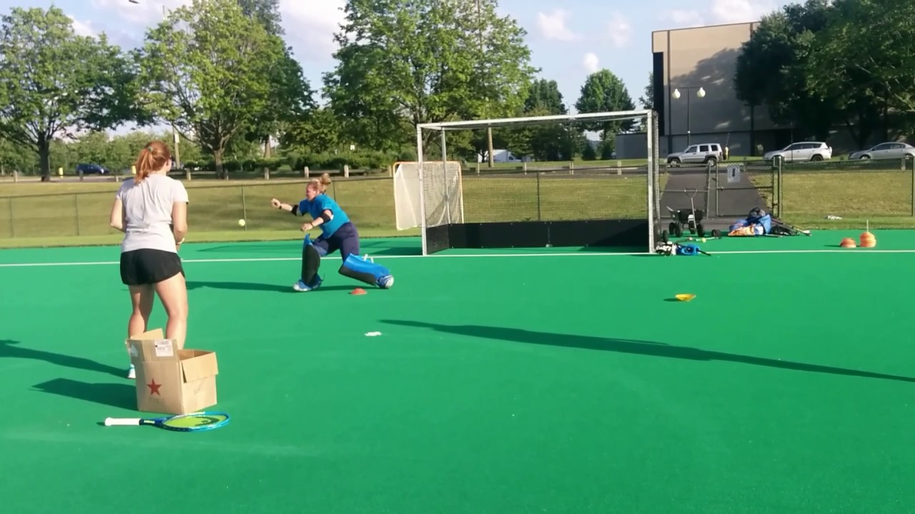 Field hockey goalie drill slides and catching tennis balls YouTube