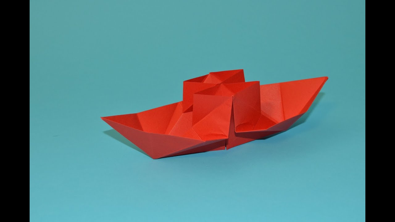 Como hacer un barco de papel