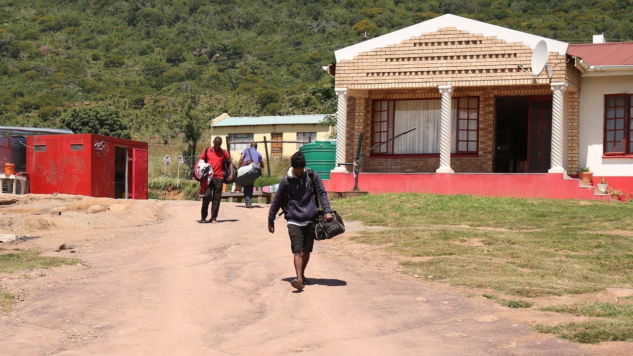 Members of the Seven Angels church in Ngcobo return home