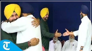 Political adversaries Navjot Sindhu, Bikram Majithia hug each other at opposition meet in Jalandhar
