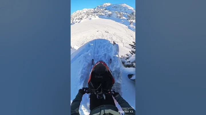 Insane snowmobile cliff by Curtis Gage in Whistler...