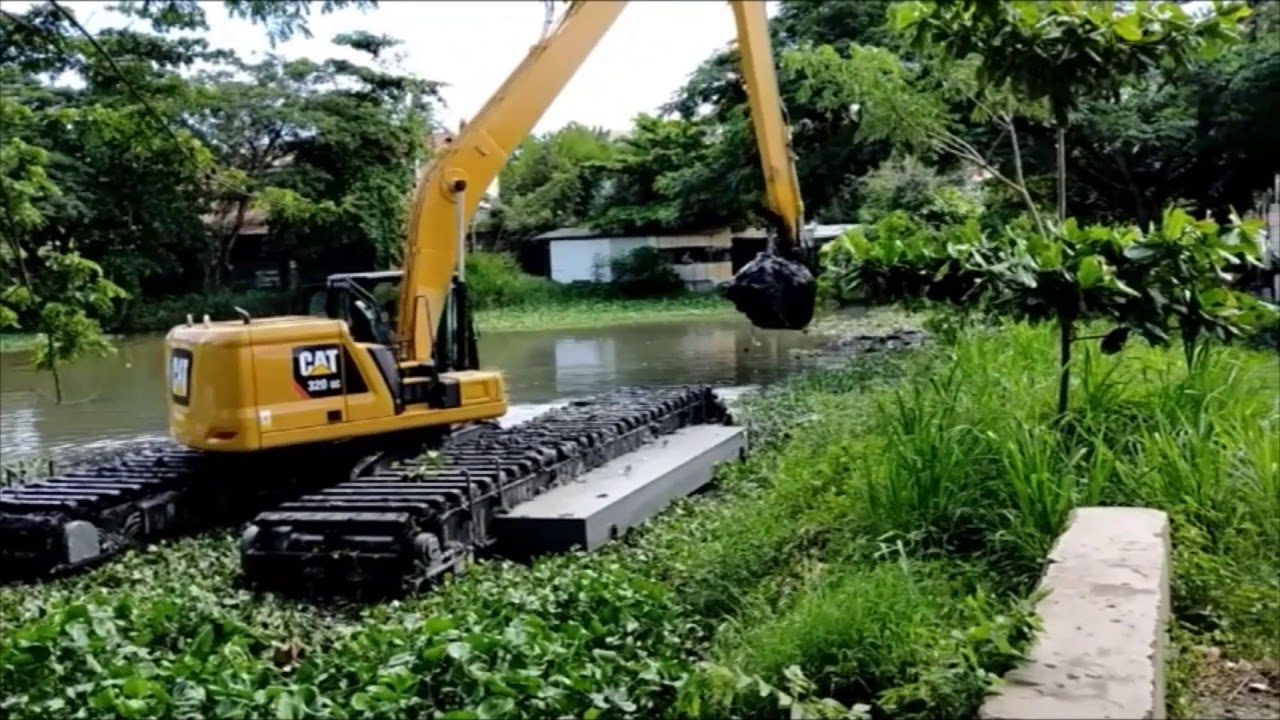 amphibious excavator AX 330 CAT 320 GC long arm Ultratrex pontoon