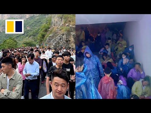Видео: Chinese tourists stranded on mountain during Golden Week holiday