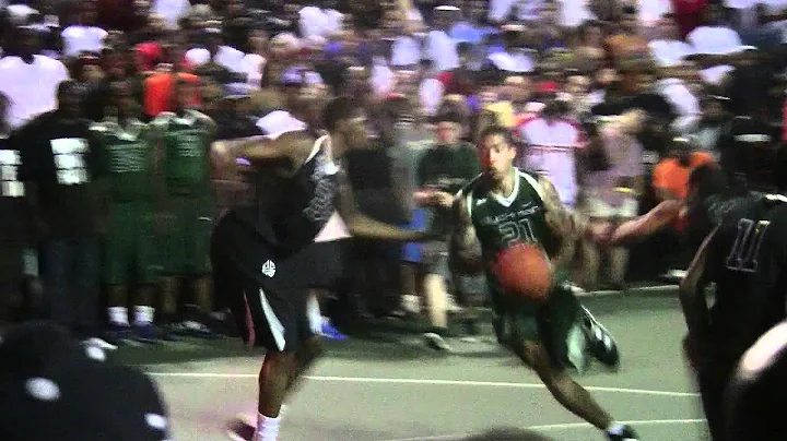 Michael Beasley dribbles and drives past Kevin Durant for the score at Dyckman Park