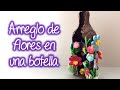 Arreglo de flores en una botella, Flower arrangement in a bottle