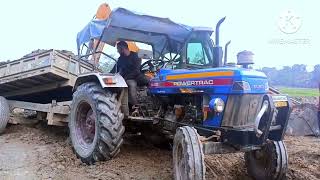 JCB 3dx backhoe machine loading mud in Somalia DI RxR tractor