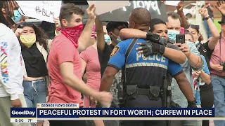 HUGS FOR COPS -- Fort Worth police join in peaceful protests after curfew