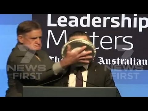 Qantas CEO gets pie shoved in face