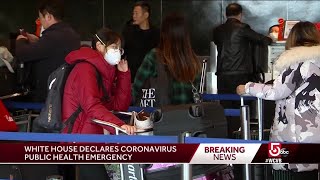 Logan passengers react to heightened coronavirus warnings