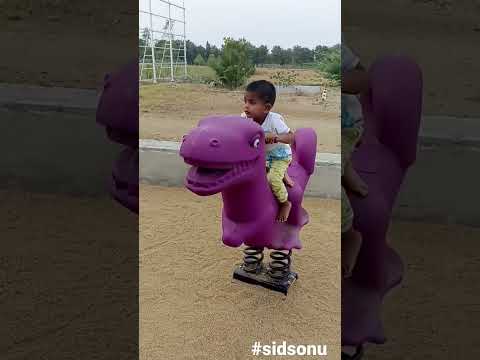 Toddler riding dino sonu kutti சோனு #climbing #milestone #toddler #25months #india #playtime