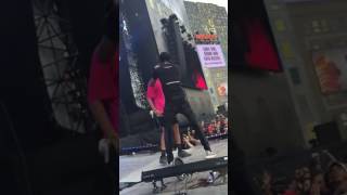 TRAVIS SCOTT ALLOWS FAN ON STAGE DURING PERFORMANCE