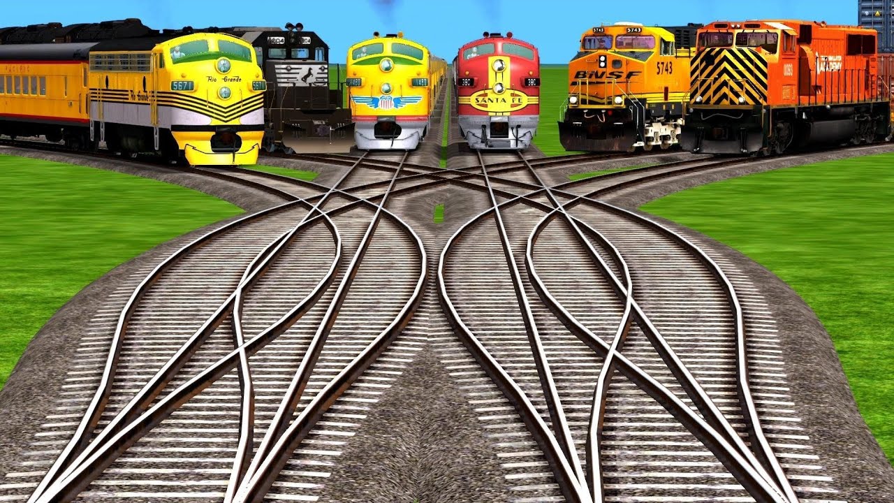Diamond R Train Diesel And Electric Trains Crossing By Diamond Railroad Tracks l ...