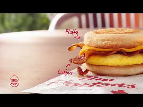 Tim Hortons | Tastier Bacon Breakfast Sandwich - Breakfast just got better! Try our new Tastier Bacon Breakfast Sandwich with crispier bacon and a fluffy English muffin. Taste the difference today!