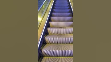 Why do escalator steps have grooves?