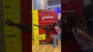 Little Girl Imitates Karate Kid Poster Kick, Falls