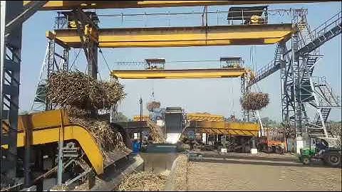 Sugar cane unloading , sugar factory ,cane unloading , factory work.