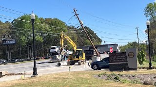 Buford Highway shut down in Chamblee after power pole partially snaps